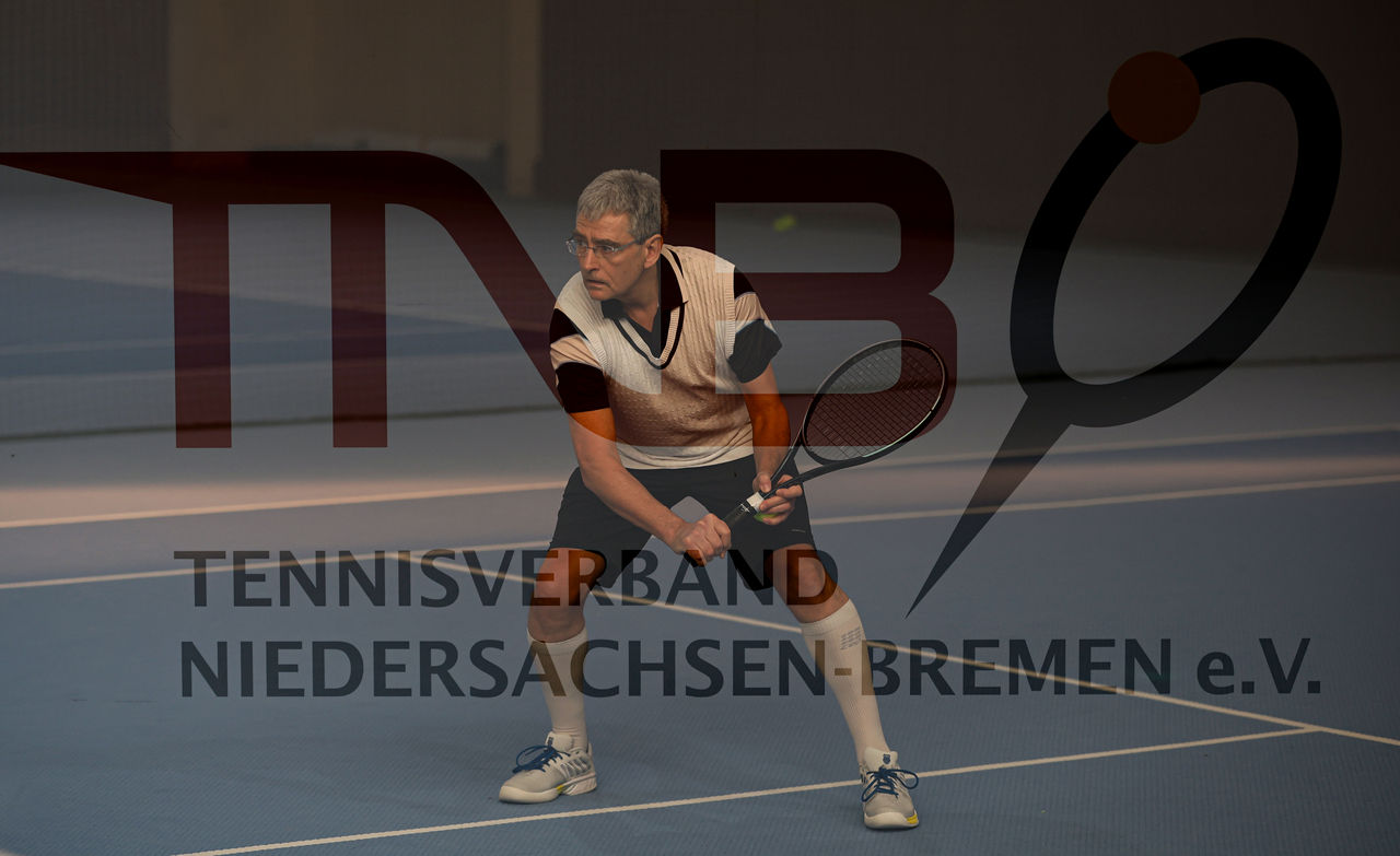 Spieler im Hintergrund - TNB Logo im Vordergrund