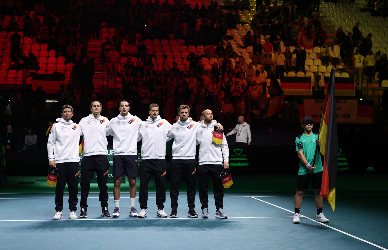 BOLOGNA, ITALY - NOVEMBER 22: Alexander Zverev, Jan-Lennard Struff, Yannick Hanfmann, Kevin Krawietz, Tim Puetz and captain Michael Kohlmann of Germany line up prior to the Davis Cup Semi-Final match between Spain and Germany at BolognaFiere Exhibition Centre on November 22, 2025 in Bologna, Italy. (Photo by Emmanuele Ciancaglini/Getty Images for ITF)